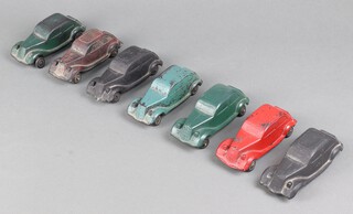 0717 Toys, a set of seven bakelite saloon cars each 13cm l x 5cm w, two black, two green, 1 blue, 1 red and 1 maroon. 