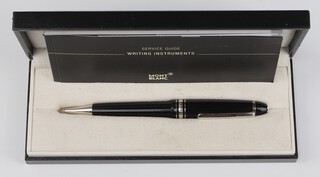 A Mont Blanc propelling ballpoint pen, boxed with guarantee, engraved 