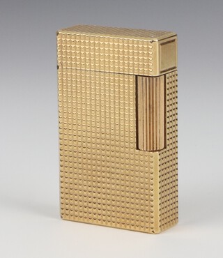 A gentleman's gold plated Dupont cigarette lighter