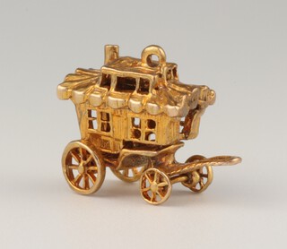 A 9ct yellow gold charm in the form of a stagecoach 4.8 grams 