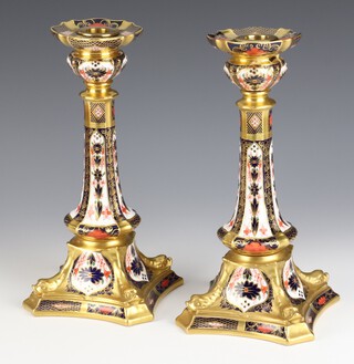 A pair of Royal Crown Derby Imari pattern  candlesticks 1128, 27cm 