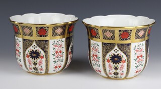 A pair of Royal Crown Derby Old Imari jardinieres decorated with flowers 1128LX1, 13cm 