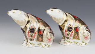 A pair of Royal Crown Derby Imari pattern polar bear paperweights (seconds), both with silver stoppers 10cm 