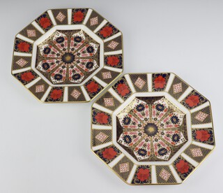 A pair of Royal Crown Derby Old Imari octagonal plates 1128MMX 22cm, boxed