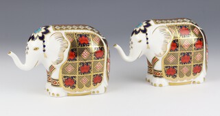 A pair of Royal Crown Derby Imari pattern  elephant book weights LX11, both with silver stoppers (both seconds) 10cm 