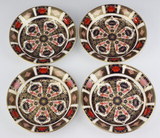 Four Royal Crown Derby Old Imari pattern dishes -  1128LX, 1128MM111, and 111 (x2) 17cm 