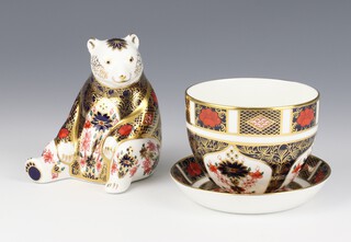 A Royal Crown Derby Imari pattern paperweight  in the form of a seated bear with silver stopper 10cm, a ditto pin dish 1128XL 11cm and a bowl (cracked) 6cm 