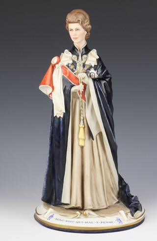 A Capodimonte figure of Her Majesty Queen Elizabeth II signed B Merli and numbered 357, 37cm 