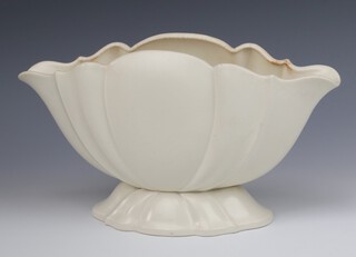 A Bretby cream glazed scalloped vase with spread foot, impressed marks 33cm 