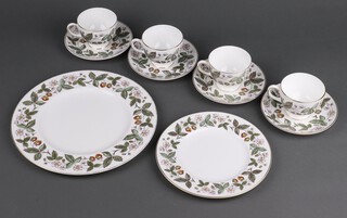 A Wedgwood Strawberry Hill pattern tea and coffee set comprising 17 dinner plates, 8 side plates (rubbed gilding), 9 small plates, 13 tea plates (3 cracked and gilt rubbed), 13 cups, 13 saucers, (1 cup, 1 saucer cracked)