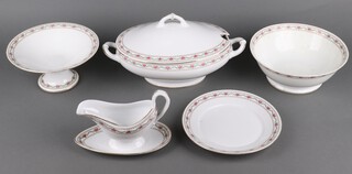 A Richard Ginori transfer print dinner service comprising soup tureen, 2 meat plates, a comport, a leaf shaped dish, a bowl (cracked and chipped), a jug (handle a/f), 6 side plates (1 cracked), 15 dinner plates, 6 soup bowls 