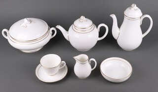 A Royal Worcester Contessa pattern tea and dinner service comprising coffee pot and cover, teapot and cover, oval dish, 6 dinner plates, 6 side plates, 6 tea plates, 6 soup bowls, 6 dessert bowls, 1 rubbed, sauce boat and stand, bread and butter plate, 4 cups, 6 saucers