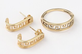 A 14ct yellow gold Greek key pattern ring size N, a pair of matching ear studs, 4.4 grams 