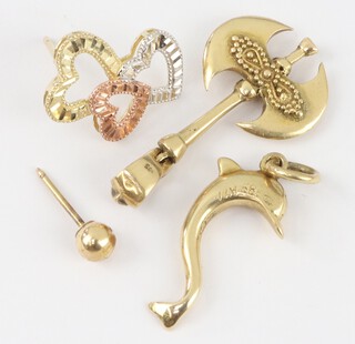 A 14ct yellow gold axe pendant, a ditto dolphin and an ear stud, 4.3 grams together with a 10ct ear stud 0.7 grams 