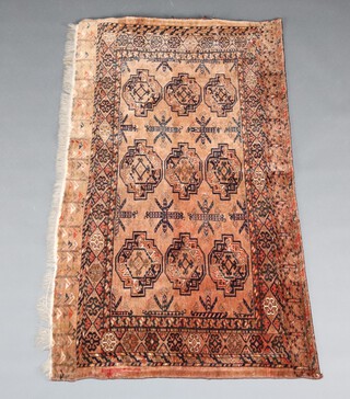 A section of red and blue ground Bokhara carpet with 9 octagons 157cm x 90cm 