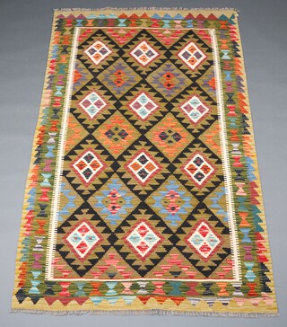 A black and green ground Maimana Kilim rug with all over diamond design 208cm x 124cm 