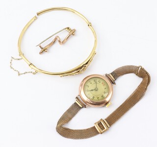 A 9ct yellow gold bracelet (a/f), a ditto bar brooch and a 9ct yellow gold watch, weighable gold including brooch pin 8.8 grams