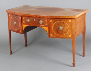 A Georgian bleached and inlaid mahogany bow front sideboard, fitted a drawer flanked by a cellarette drawer and drawer, raised on square tapered supports, spade feet 89cm h x 39cm w x 75cm d 