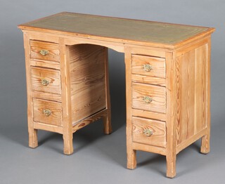 A Victorian pitch pine desk of small proportions and inset green leather writing surface above 6 short drawers 72cm h x 100cm w x 46cm d (the desk is in one section) 