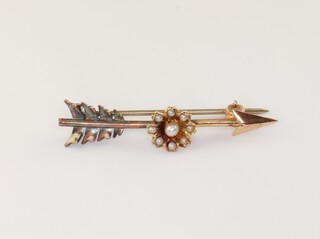 A 15ct yellow gold bar brooch 3.1 grams, a 9ct yellow gold arrow ditto 2.1 grams