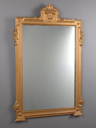 A 19th Century rectangular plate wall mirror contained in a gilt frame surmounted by a cherub 104cm h x 65cm w 