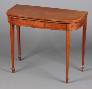 A Georgian crossbanded and inlaid mahogany card table, raised on square tapered supports 74cm h x 88cm w x 43cm d 