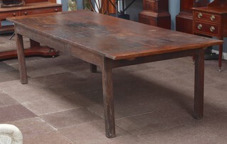 An 18th/19th Century French elm dining table, raised on square supports 77cm h x 281cm l x 105cm w 