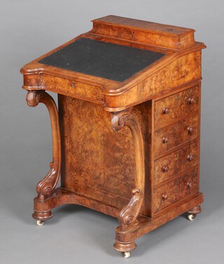 A Victorian inlaid figured walnut Davenport desk with stationery box and green inset writing surface, the interior fitted 2 drawers,  the pedestal fitted 4 drawers 84cm h x 54cm w x 57cm d 