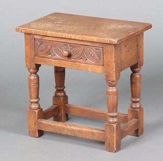 A 17th Century style carved oak side table fitted a drawer, raised on turned and block supports with box framed stretcher 46cm h x 44cm w x 29cm d  