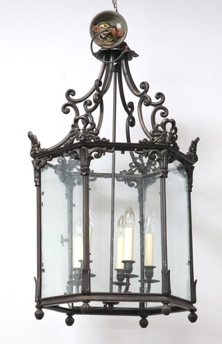 A Georgian style wrought metal 5 light hexagonal hall lantern 85cm h x 50cm w 