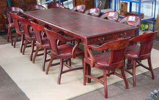 A Victorian style mahogany board room suite comprising rectangular meeting table with inset writing surface, fitted a drawer and raised on square tapered supports ending in spade feet 78cm h x 274cm l x 106 cm w and 13 tub back chairs with upholstered seats and backs, raised on square supports with H framed stretchers 87cm h x 52cm w x 41cm d (seats 27cm x 27cm) 