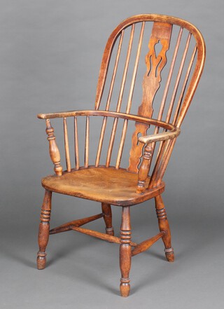 A 19th Century elm stick and rail back Windsor carver chair with solid seat on turned supports with H framed stretcher 105cm h x 57cm w x 36cm d (seat 33cm x 31cm) 