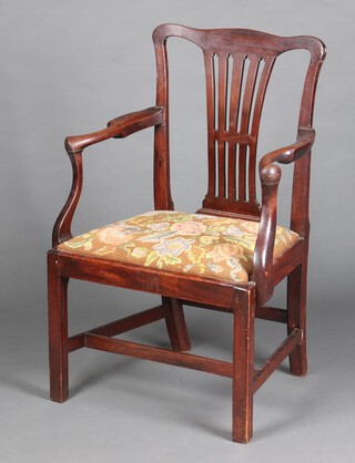 A Georgian mahogany open arm carver chair with pierced splat back and upholstered drop in seat, raised on square tapered supports with H framed stretcher 94cm h x 60cm w x 47cm d (seat 26cm x 27cm)  