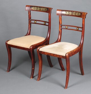 A pair of 19th Century simulated rosewood and inlaid brass bar back chairs with drop in seats 86cm h x 45cm w x 44cm d (seat 29cm x 35cm)  