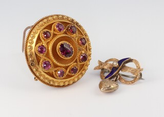 A Victorian yellow gold, testing as 9ct, foil backed amethyst set brooch together with a gilt and enamelled pearl set brooch 