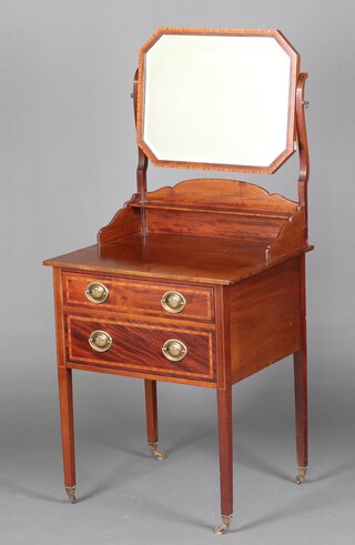 An Edwardian inlaid mahogany dressing table with octagonal bevelled plate mirror and shelf above a shelf and 2 long drawers, raised on brass caps and casters 136cm h x 61cm w x 50cm d 