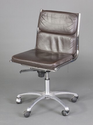 Mid-Century, a chrome and brown leather revolving armchair 88cm h x 50cm w x 45cm (seat 33cm x 26cm) 