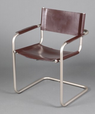 In the style of Marcel Breuer, a cantilever armchair upholstered in brown leather 81cm h x 60cm w x 51cm d (seat 30cm x 28cm) 