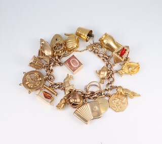 A 9ct yellow gold charm bracelet, gross weight 58 grams
