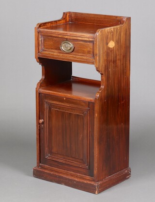 An Edwardian ships style mahogany bedside cabinet with 3/4 gallery above 1 long drawer, recess and cupboard, raised on a platform base 100cm h x 46cm w x 35cm d (possibly reduced in height) 