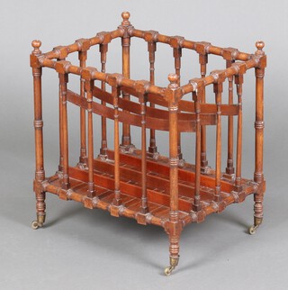 A Georgian mahogany 4 section Canterbury, raised on turned supports, brass caps and casters 50cm x 47cm x 35cm d, the base with a Christies The T Crowther & Sons Collection 