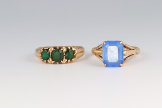 A 15ct yellow gold paste set ring size O, 3.2 grams and a 9ct paste set ring size N, 2.9 grams 
