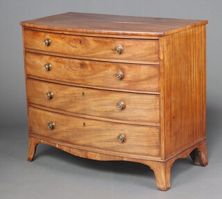 A Georgian bleached mahogany bow front chest of 4 graduated drawers, raised on splayed bracket feet 98cm h x 102cm w x 52cm d 