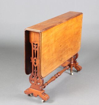 A Victorian rectangular mahogany Sutherland table, raised on pierced panel end supports, turned legs with ceramic casters 71cm h x 91cm w x 17cm d 
