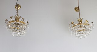 A pair of circular gilt metal 3 drop electroliers 23cm x 27cm diam. 