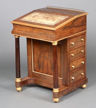 A Regency rosewood Davenport with brass gallery, hinged stationery box and leather inset writing surface, the maple interior fitted 2 short drawers, the pedestal 4 drawers with gilt painted handles and columns to the front 81cm h x 57cm w x 56cm d 