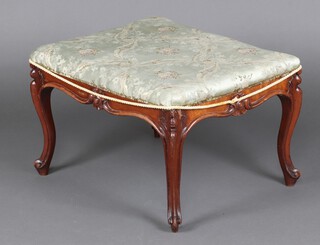 A Victorian rectangular carved mahogany stool with upholstered seat, raised on cabriole supports 41cm h x 62cm w x 56cm 