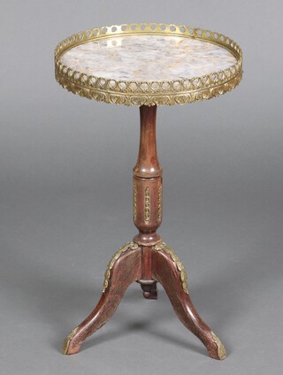 An Empire style mahogany wine table with white veined marble top, pierced gilt gallery, and gilt metal mounts, raised on a turned and fluted column with tripod base 58cm h x 34cm diam. 
