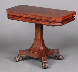 A William IV mahogany tea table, raised on square chamfered column with triform base and paw feet 73cm h x 92cm w x 46cm d 