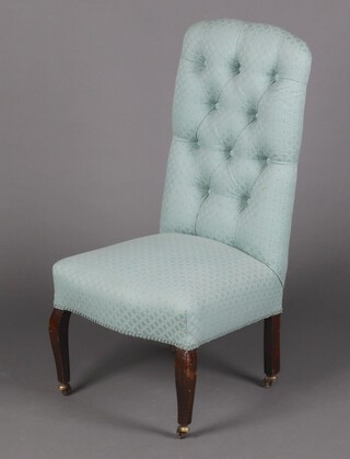 A Victorian nursing chair upholstered in blue buttoned material, raised on cabriole supports 92cm h x 47cm w x 42cm d (20cm x 26cm)